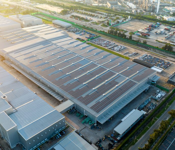 Industrial warehouse with solar panels on the roof